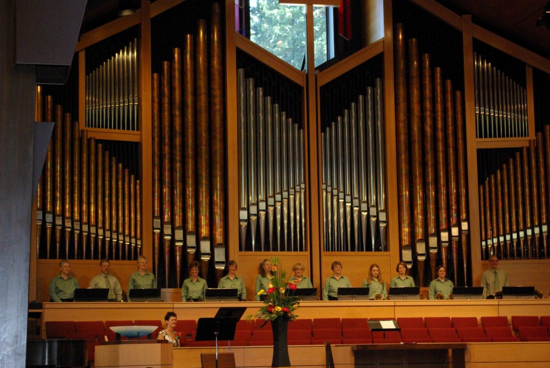 The full-height pipe organ filling the sanctuary wall at Lake Grove Presbyterian Church